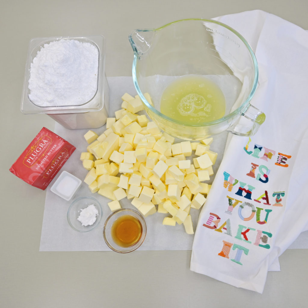 ingredients for faux swiss meringue buttercream frosting. ingrédient flat lay for buttercream frosting.